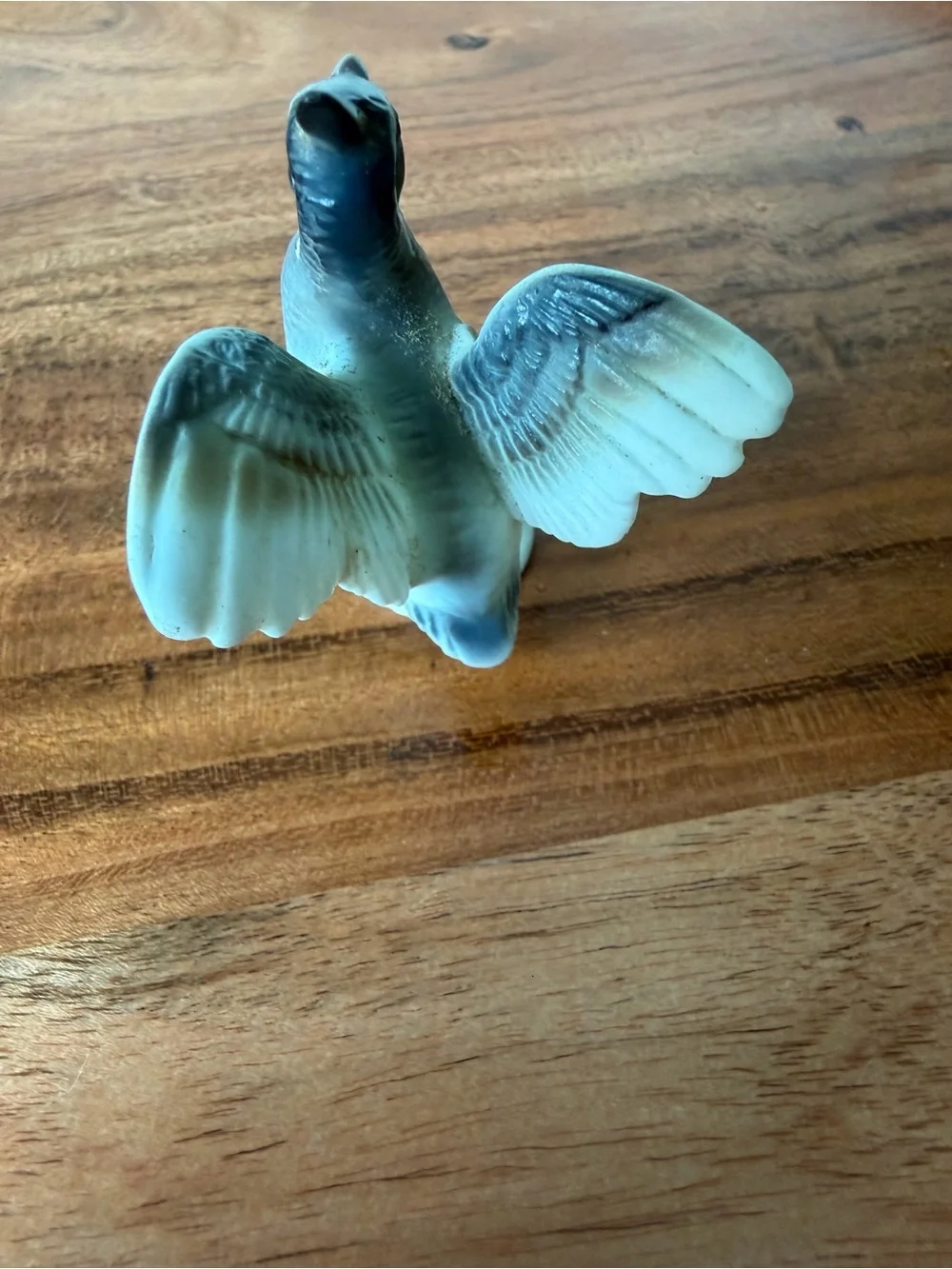 Vintage tiny hand-painted ceramic or porcelain quail figurine